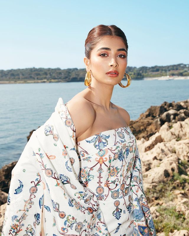 Pooja Hegde is a sight to behold in a white dreamy gown as she makes her Cannes red carpet debut