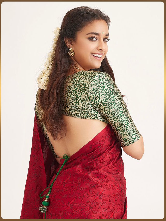 Keerthy Suresh stuns in traditional red saree