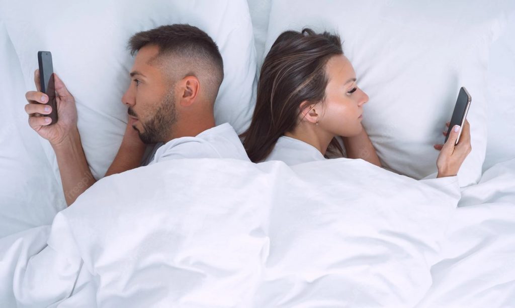 Phone Between Couple