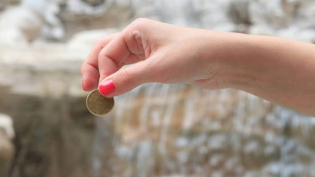 Tossing Coins In River
