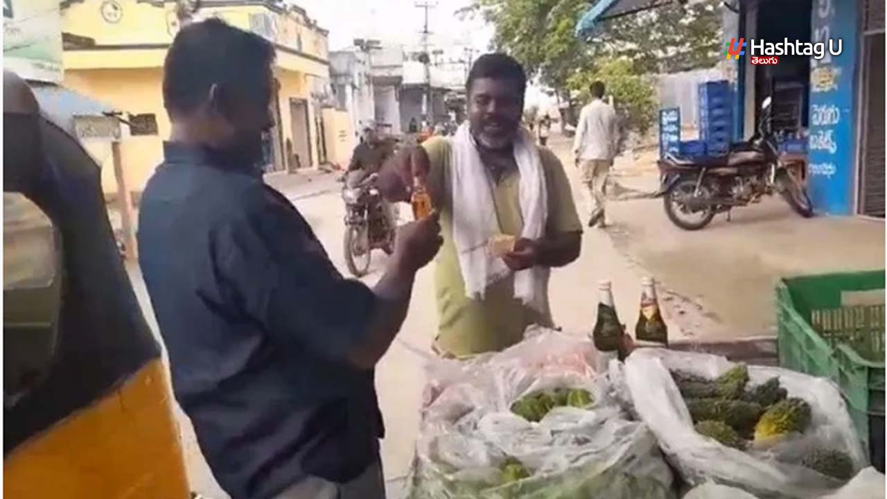 Man Sell Alcohol on Vegetable Cart : కేటీఆర్ ఇలాకాలో తోపుడు బండిపై కూరగాయలతో పాటు మద్యం అమ్మకం..