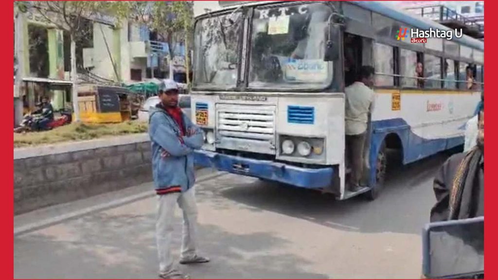 Man Protest Infront Of Bus