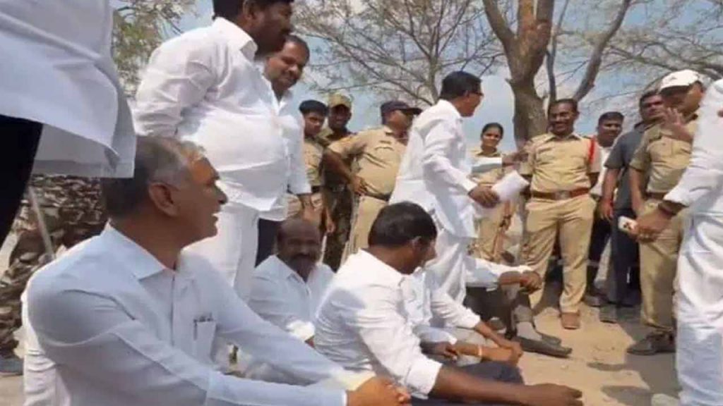 Harish Rao, who reached the SLBC tunnel, protest on the road.