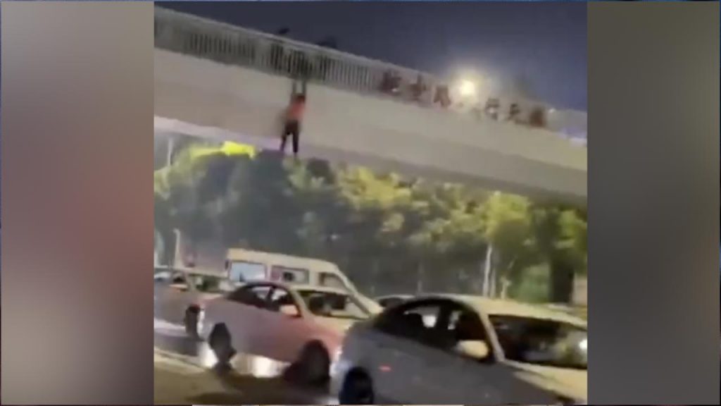 Drunk Man Hanging From Flyo
